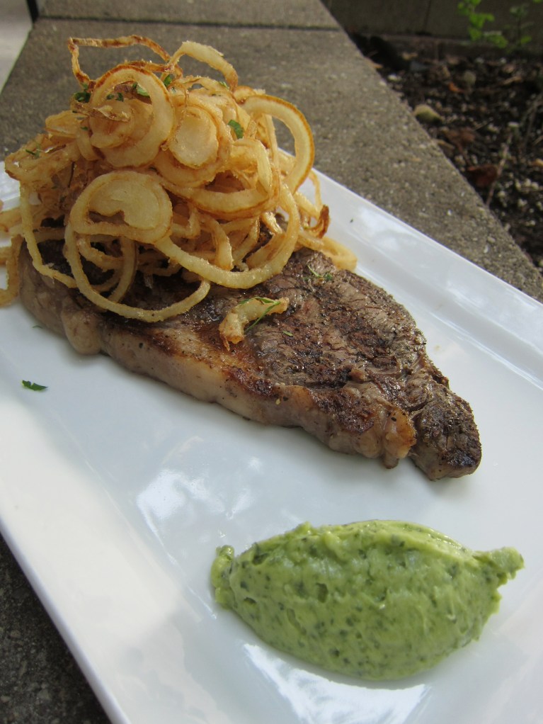 Bison ribeye with onion straws